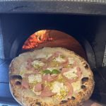 flying tomato pizza